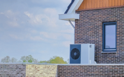 A front view of a home with an air unit outside the window.